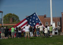 The folding of the flag. Note the people for scale.