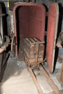 Well this is interesting. The silk had to be 'set' or 'fixed'.  Part of the process involved heating the silk(silk does not tolerate heat well) and then placing it in these pressurized containers. This may be how the silk was actually shipped. Note that one of the boxes is labeled 