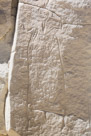 While noted for warrior shields, this glyph is the most famous at the Castle Gardens rock art site. This male character covered with 9 bear paw prints. Does this represent a person killed by bears or a great killer of bears?? Note the V sholders comon to human representions in rock art in this area.