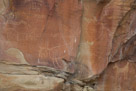 Well we have a relatively old elk in the center. He appears to have been chalked in at one time. To his left is a relatively old but poorly (single tool?) quadraped with long ears.  The other glyphs appear to be relatively modern.