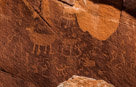 The wavy lines to the left are the same ones from a previous crop repeated here. There is a find boat style sheep in the middle with ball feet.  Below him are two feet(bear) with toes indicated. There is the turtle like figure in the lower center. This is very old. More on him later.  Note the sawtooth line cutting across the center of the image from the lower left to the spall in the upper center right. Several very old 'wavy' lines on the right side.