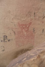 And here is this fellow again.  The left arm? on this figure appears to be real and part of the original. Interestingly the petroglyph across the chest of the figure appears to be just the width of the figure itself. Was this part of the original. A pictograph combined with a petroglypy?? There are pictographs at this site that exhibit this.